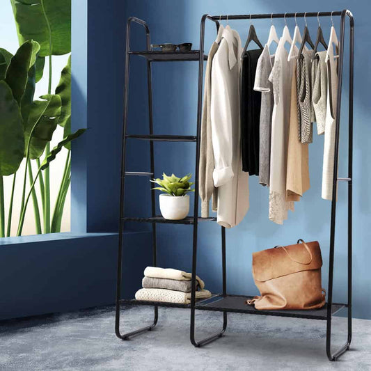 Clothes rack displaying organized wardrobe with hanging clothes and shelf storage for shoes bags and accessories