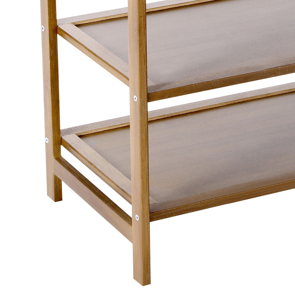 Side view of stylish bamboo clothes stand