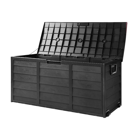 Unique 290L black outdoor storage box with wheels and handles being moved easily across deck