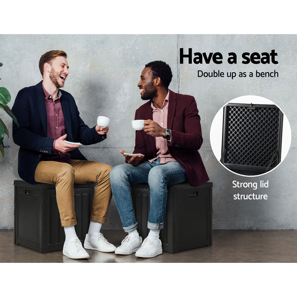 Family using outdoor storage bench for seating at BBQ gathering