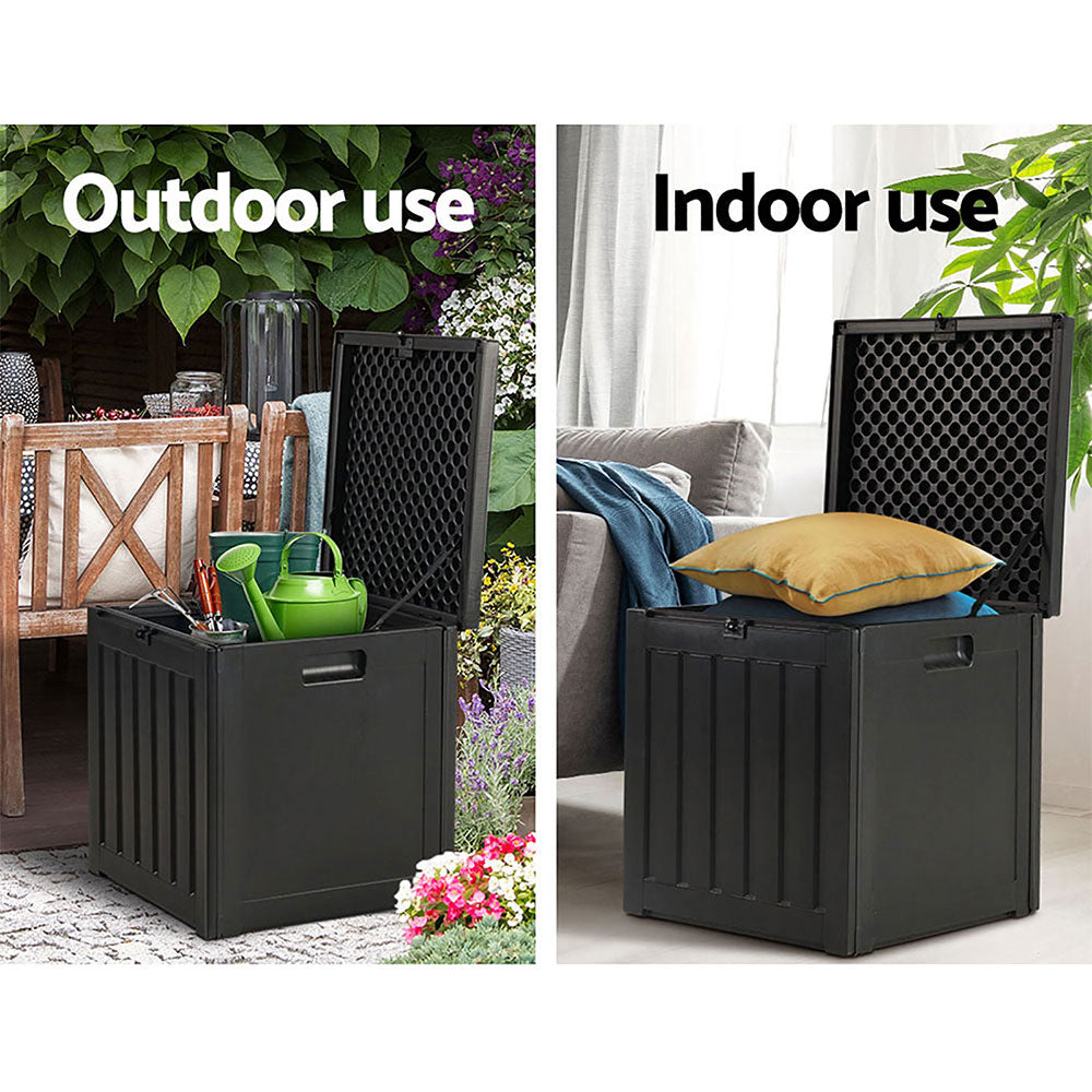 Compact outdoor storage box on apartment balcony with garden tools inside