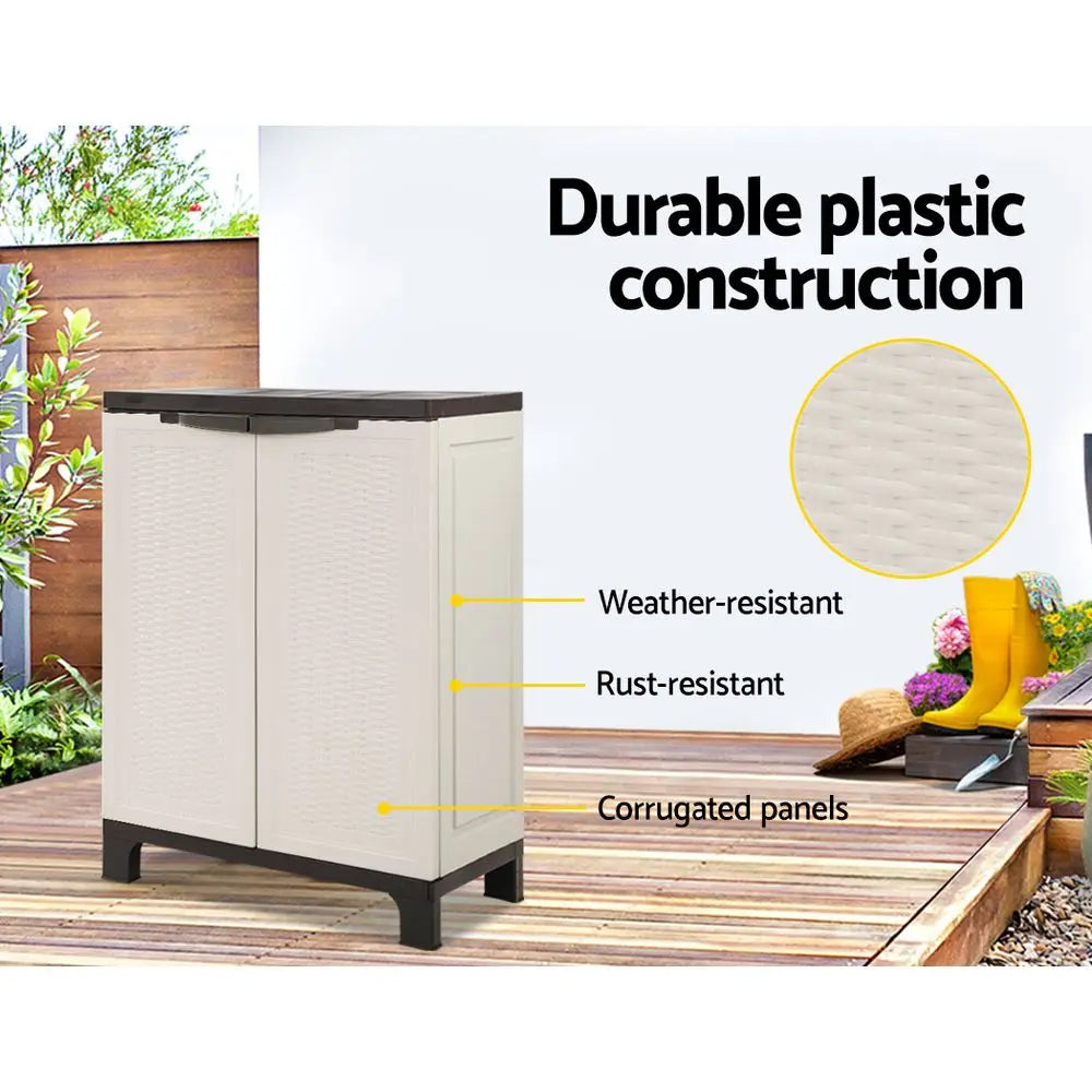 Lockable doors on weatherproof plastic storage cabinet with adjustable shelf