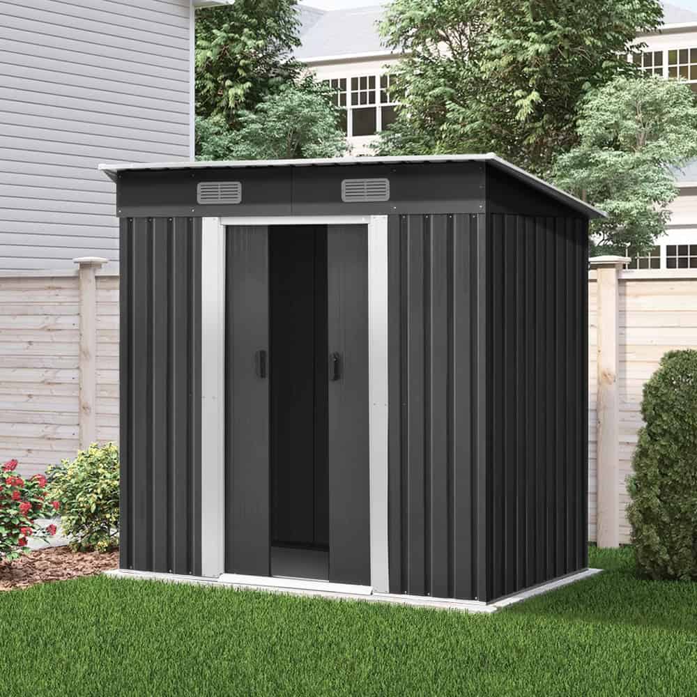 compact outdoor shed in grey with sloped roof