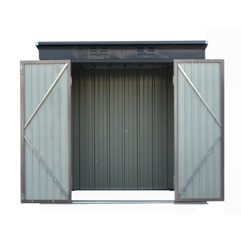 Compact shed storing lawn mower and tools