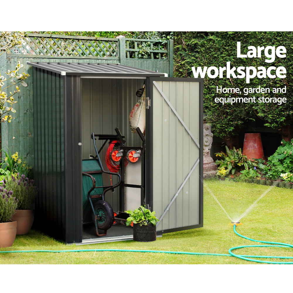 Power tools and garden equipment organized inside compact steel storage locker
