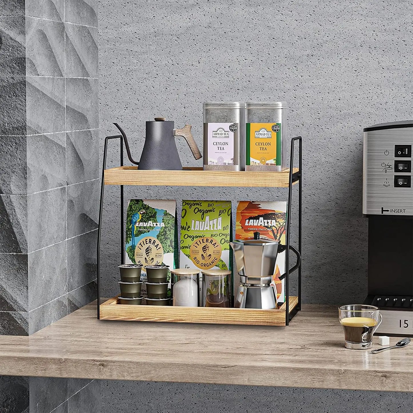 Coffee station organizer holding syrups mugs and accessories in modern kitchen