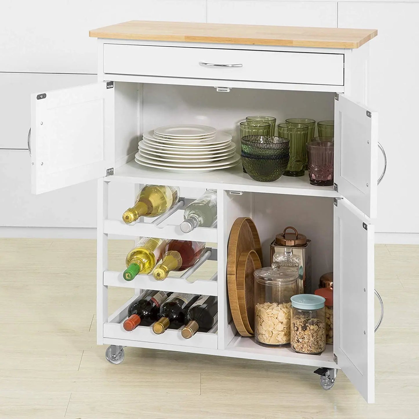 Kitchen trolley set up as mobile bar cart with wine bottles glasses entertaining dinner party setup