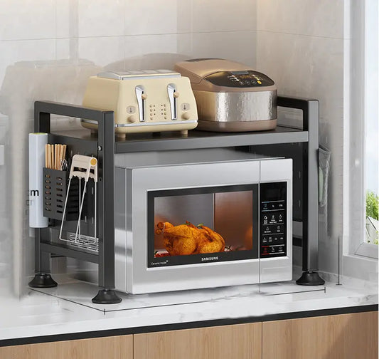 Adjustable black microwave shelf organizer with cutlery tray and spice rack for kitchen storage