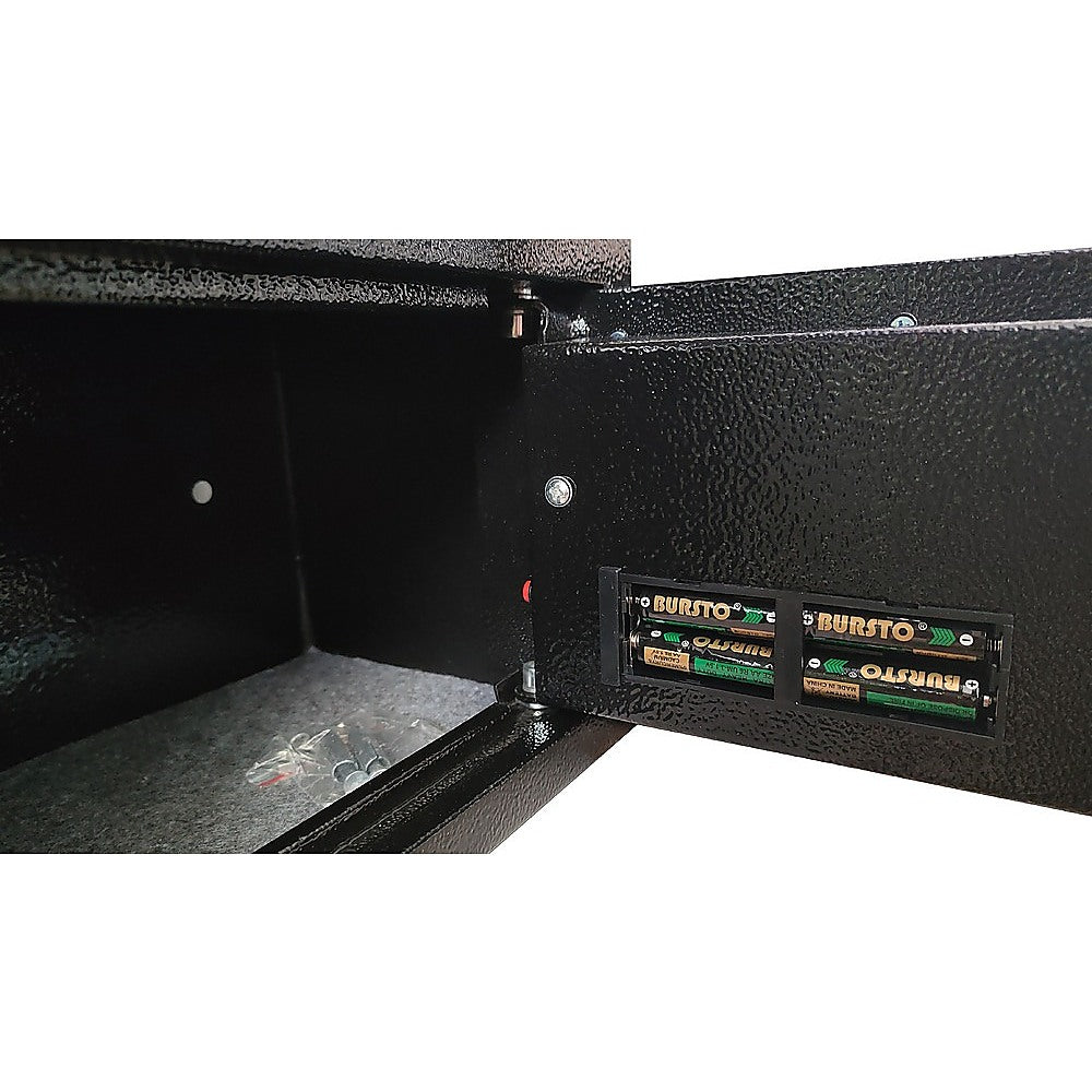 Carpeted interior of 8.5L digital security safe showing spacious storage for valuables and documents