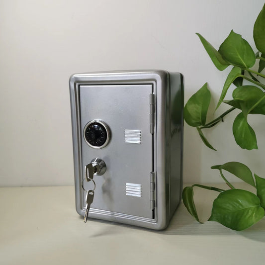 Compact silver metal safe box with combination lock and key for personal valuables