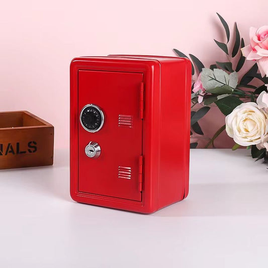 Red mini safe box with combination lock on desk