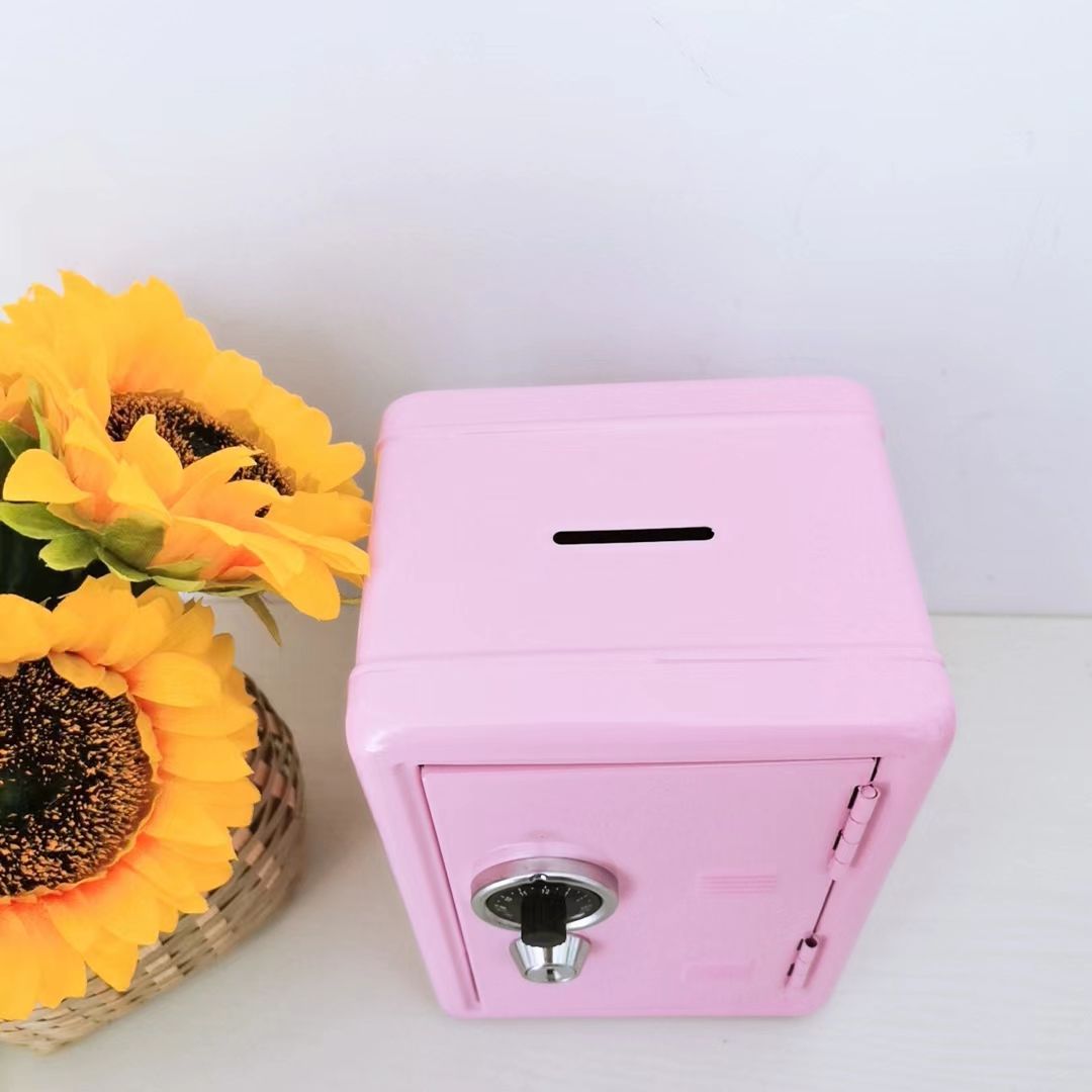 Compact red security safe in bedroom drawer