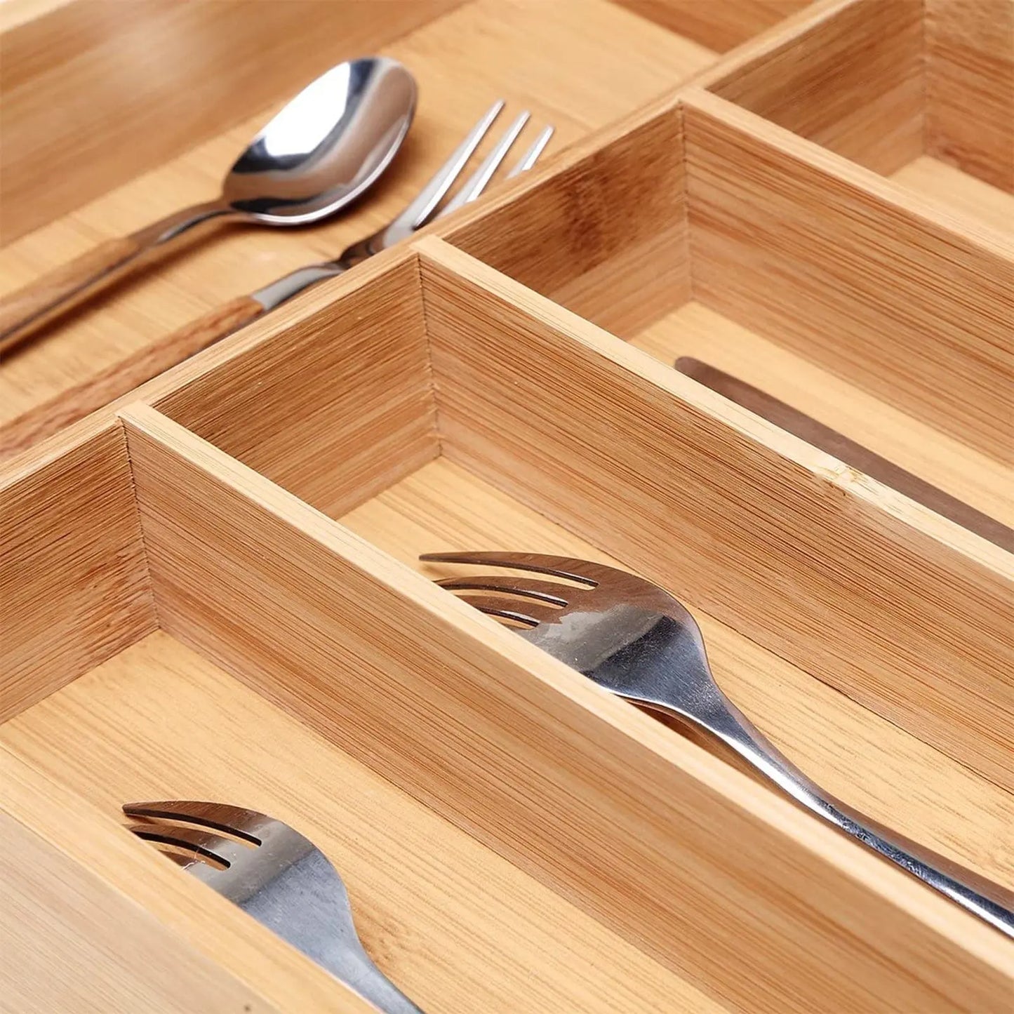Natural bamboo cutlery organiser fitted in Australian kitchen drawer with utensils