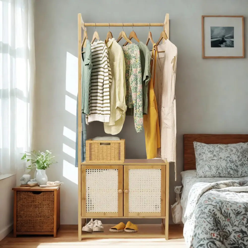 168cm tall bamboo clothes rack with coat hangers and storage cabinet in bedroom