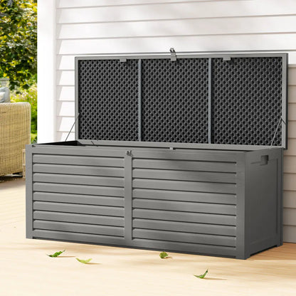 Outdoor storage box bench near swimming pool storing pool toys, floats and beach towels in Australian backyard