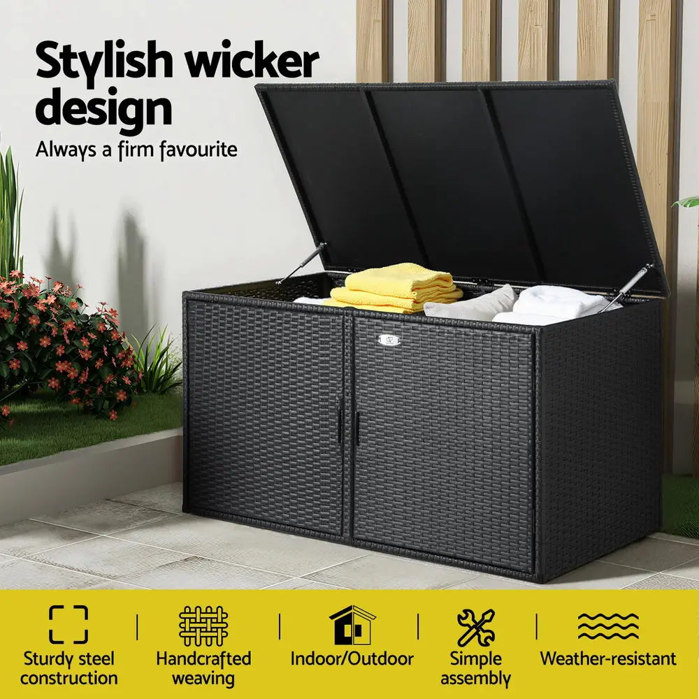 Outdoor storage cabinet open showing two-layer storage compartments for garden tools and equipment