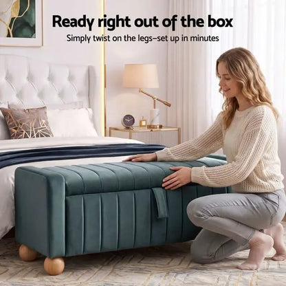 Artiss green velvet ottoman styled at the end of a bed