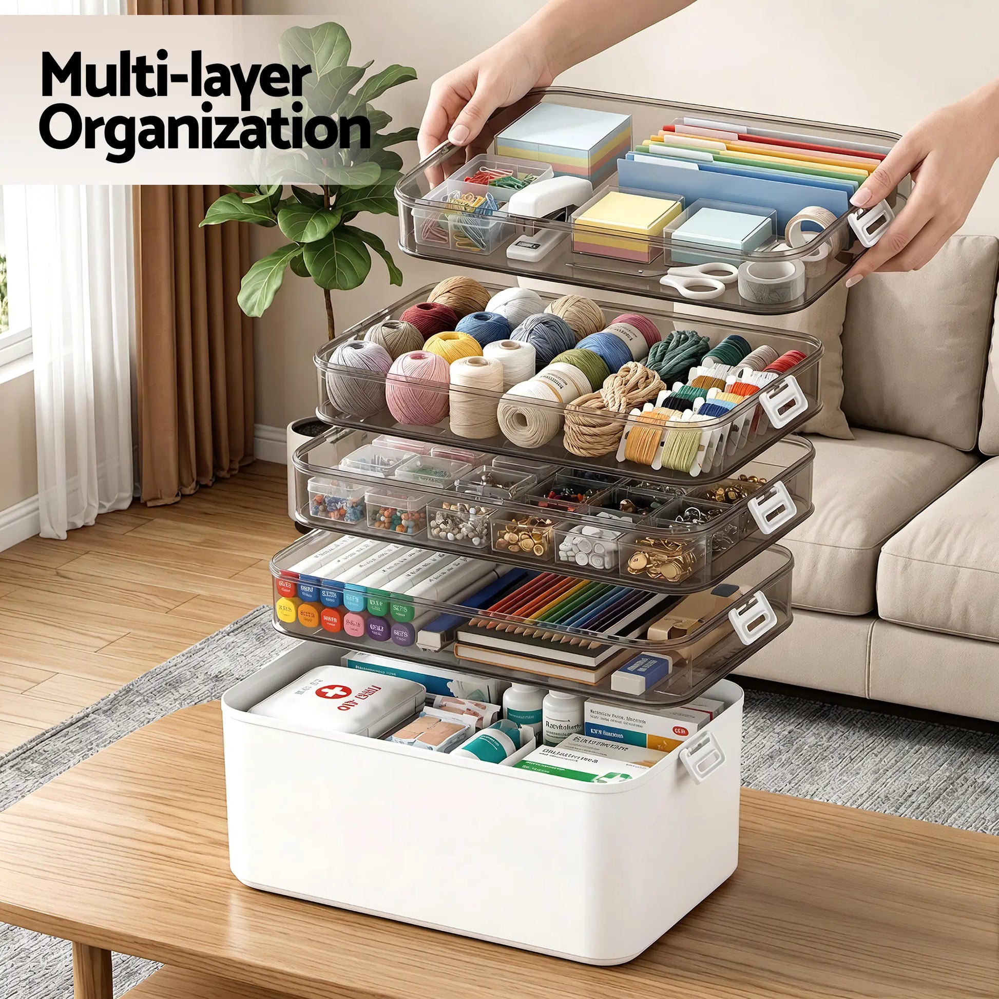 Single detachable tier from clear modular storage organiser being carried by handle showing portability