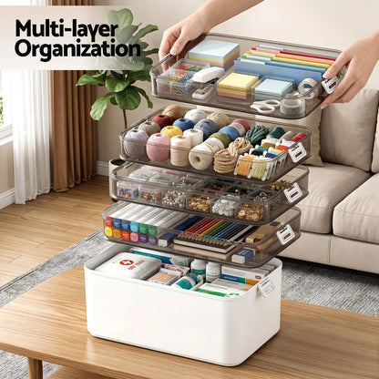 Single detachable tier from clear modular storage organiser being carried by handle showing portability