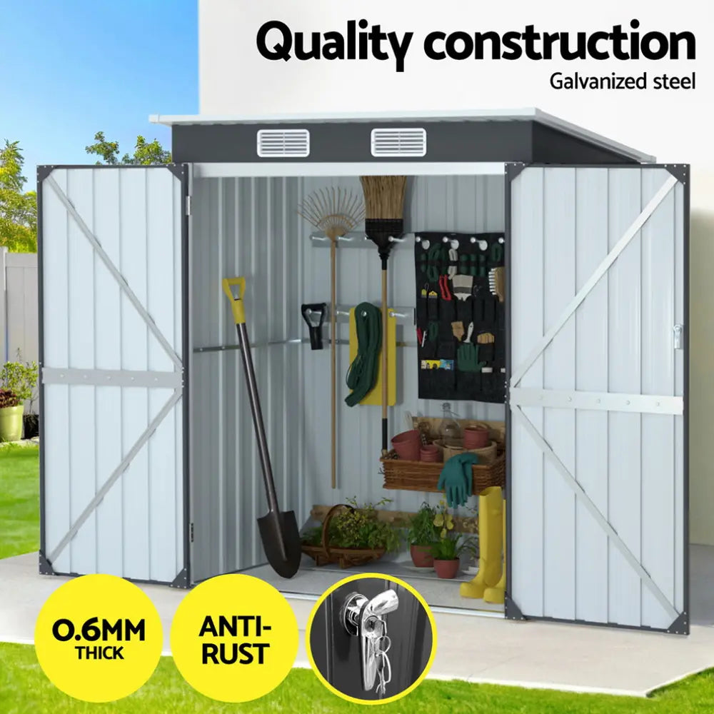 Garden shed interior showing organized storage of mower, garden tools, and outdoor equipment demonstrating space efficiency