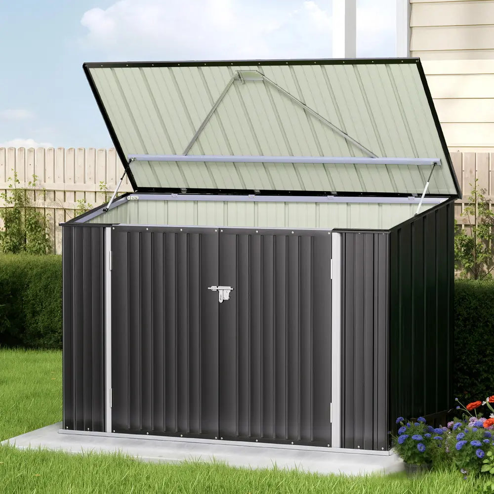 Garden shed in backyard showing weather-resistant galvanized steel construction