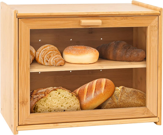 Wooden bread box with various types of bread displayed inside on a white background