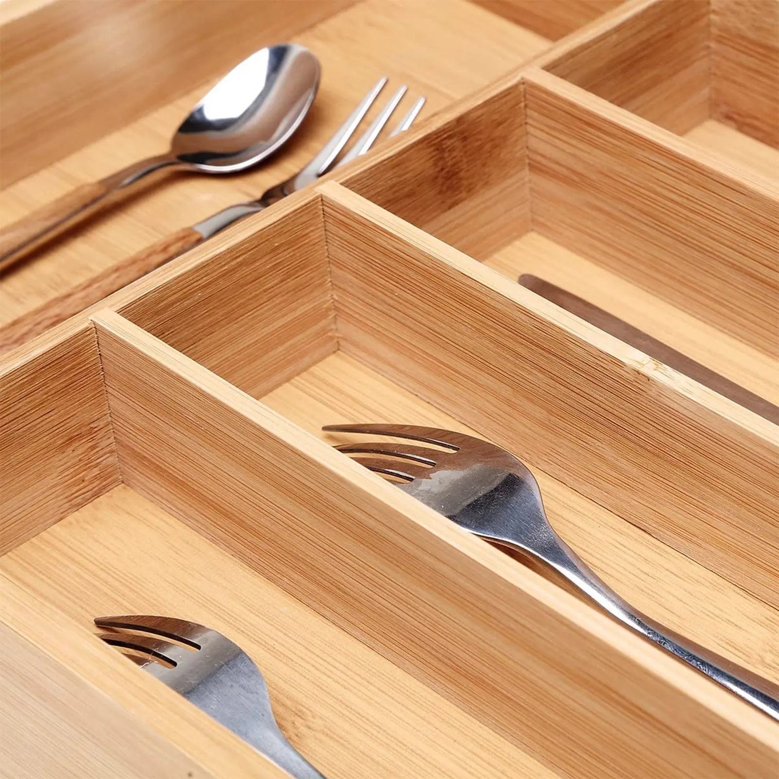 Natural bamboo cutlery organiser fitted in Australian kitchen drawer with utensils